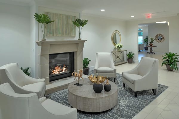 Cozy common area with a fireplace and seating