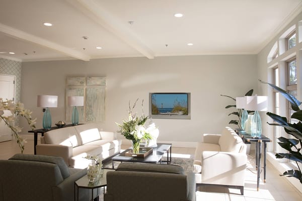 Bright common area with comfortable seating and decor