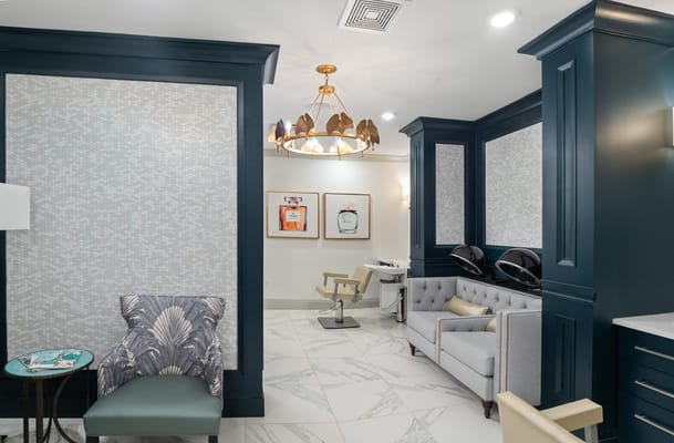 A modern beauty salon interior with stylish seating