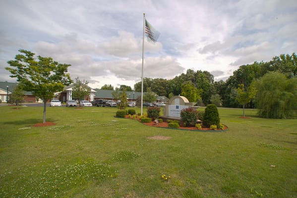 Entrance sign and landscape of The Bungalows at Jonesboro