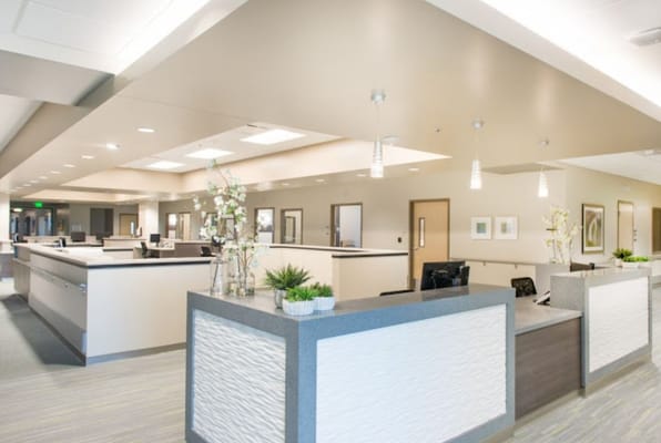 Bright and modern reception area with floral decorations