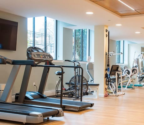 Well-equipped gym with treadmills and exercise machines