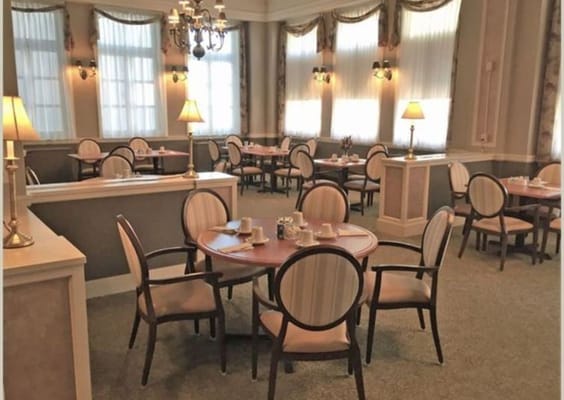 Elegant dining area with round tables and chairs