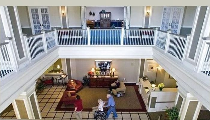 View of the lobby with residents and staff interacting
