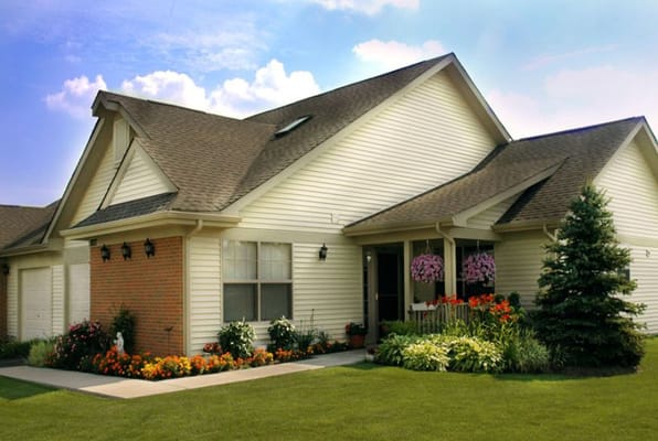 Exterior view of a residential building with flowers