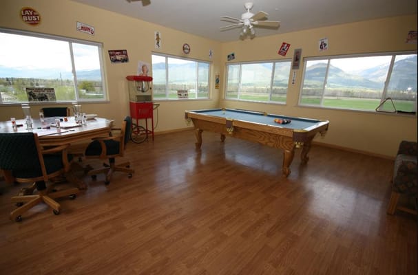 Interior view of a common area with a pool table