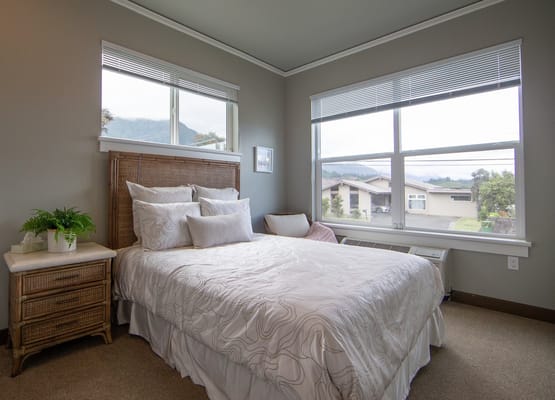 Bright and inviting bedroom with large windows