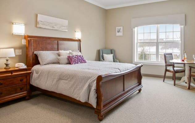 Cozy resident room with a bed and desk