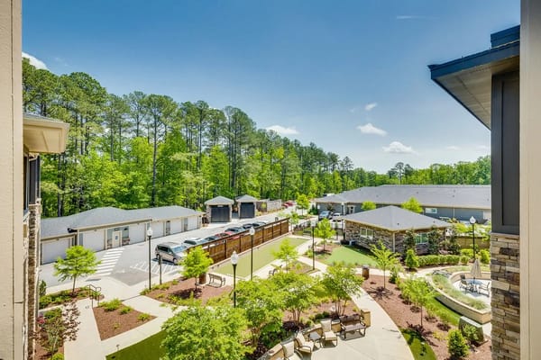 Overhead view of landscaped grounds and parking at The Reserve at Mills Farm