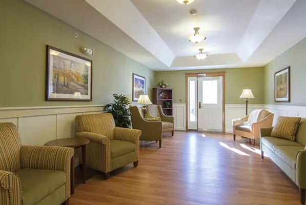 Bright common area with seating and artwork