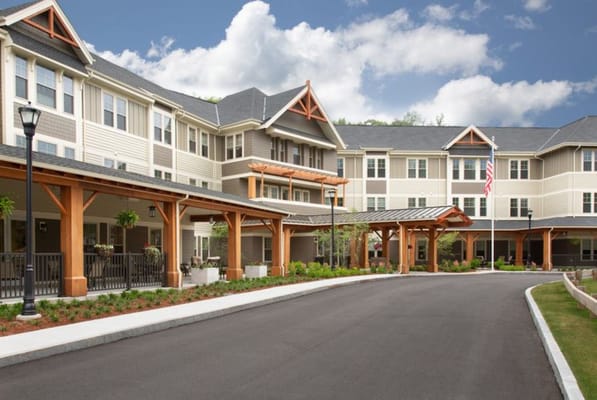 Exterior view of The Residence at Orchard Grove with covered entryway