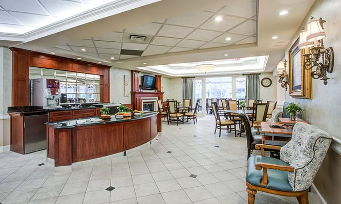 Cozy lounge area with seating and a snack bar