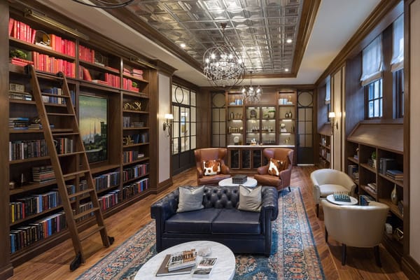 Cozy library with bookshelves and seating
