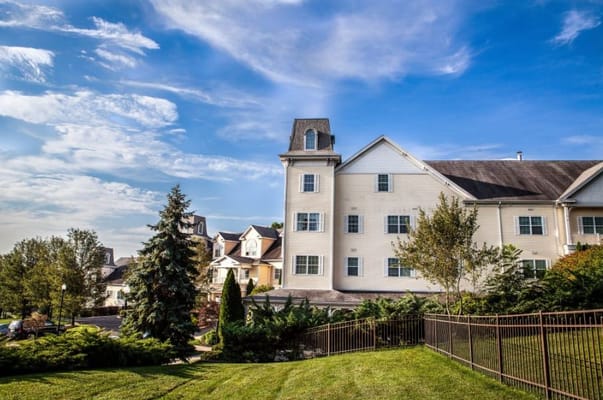 Exterior view of Van Dyk Park Place with landscaping