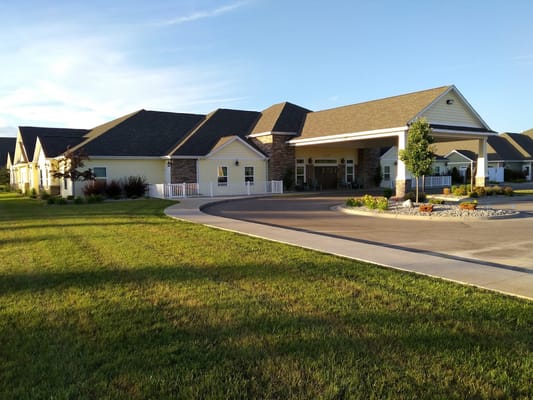 Vicinia Gardens senior living facility entrance and surrounding landscape