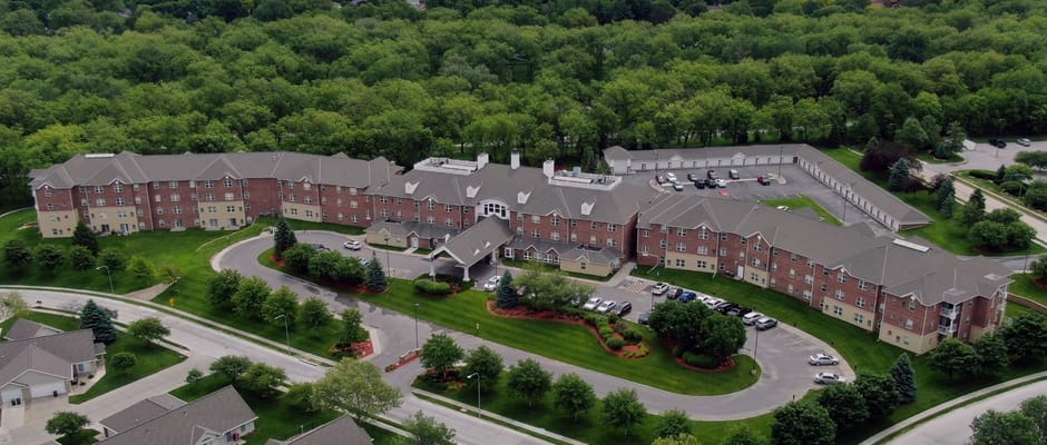 Aerial view of Walnut Grove Retirement Community surrounded by greenery.