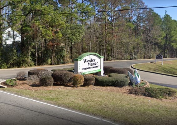 Entrance sign for Wesley Manor Retirement Community