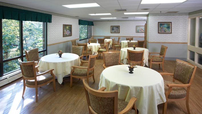 Bright dining room with tables and chairs