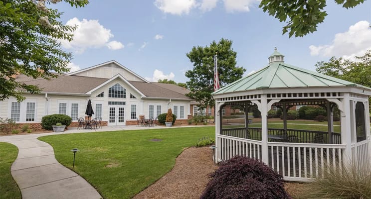 Exterior view of a retirement community with gazebo