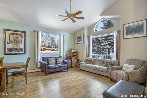 Bright common area with comfortable seating and natural light