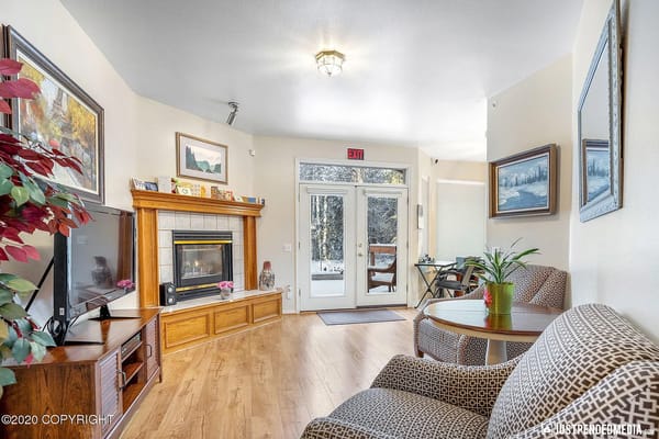 Cozy common area with seating and fireplace