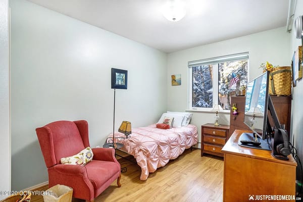 Cozy private resident room with a bed and dresser