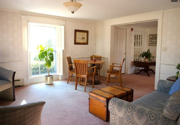 Cozy common area with seating and a dining table