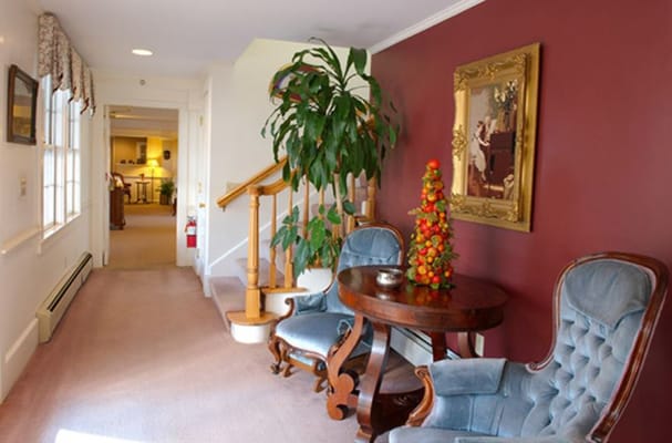 Bright indoor common area with seating and decor