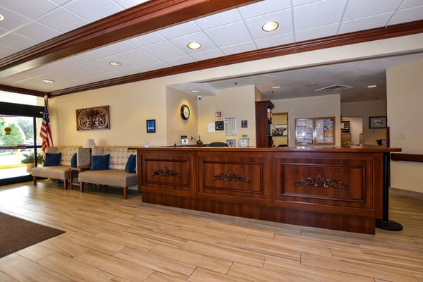 Reception area with a welcoming desk and seating