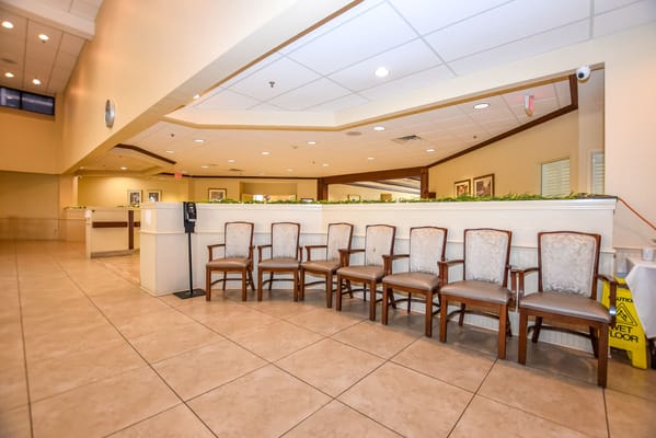Interior view of a waiting area with chairs