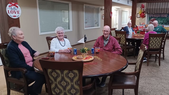 Residents enjoying a social activity in a common area