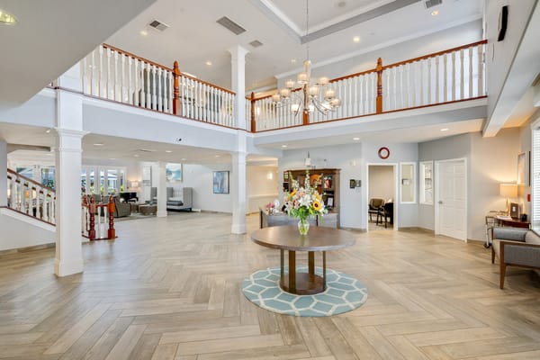 Bright and welcoming lobby area with seating and decorations