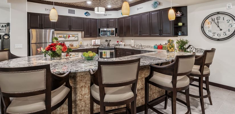 Stylish kitchen with granite countertop and seating