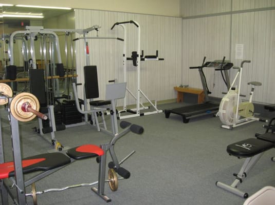 Interior view of a fitness room with exercise equipment