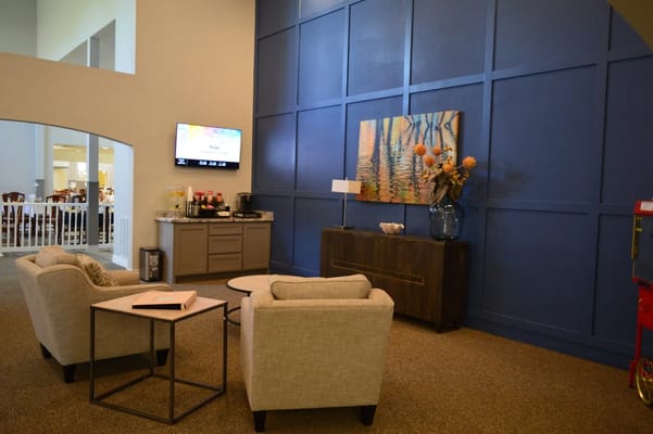 Common area with seating and wall art