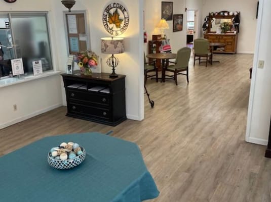 Cozy common area with seating and warm decor