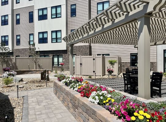 Beautiful outdoor space with flowers and seating area