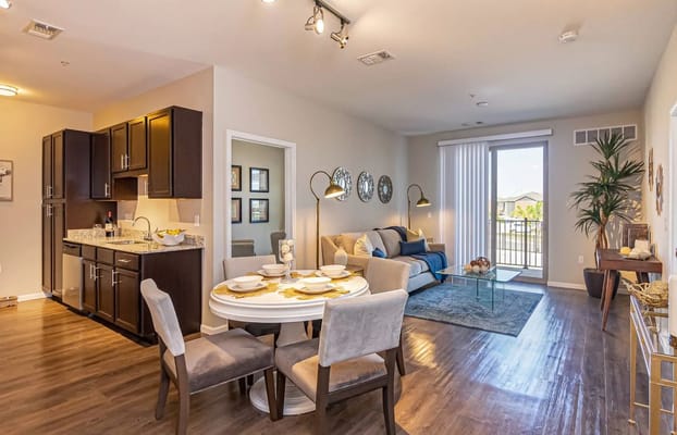 Modern living room and dining area in a facility apartment