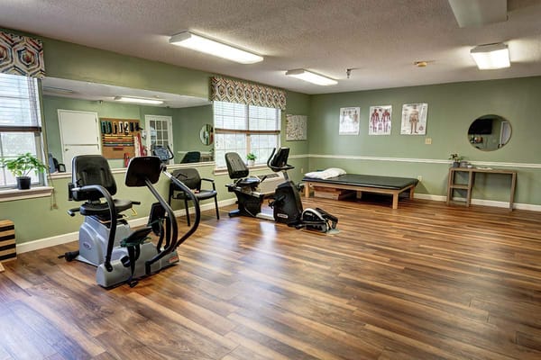 Interior view of a fitness area with exercise equipment