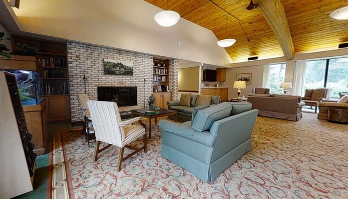 Spacious living room with comfortable seating and a fireplace