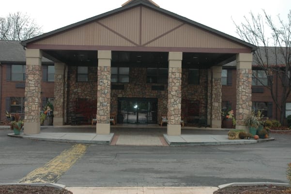 Front entrance of Garden Plaza of Valley View with stone pillars