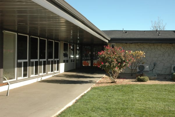 Building exterior with entrance and landscaped area