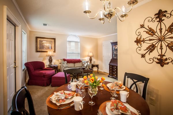 Dining area with decorative elements and a set table