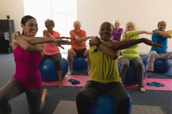 Residents participating in a group exercise class