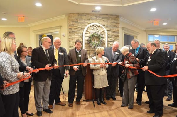 Ribbon-cutting ceremony with community leaders and staff