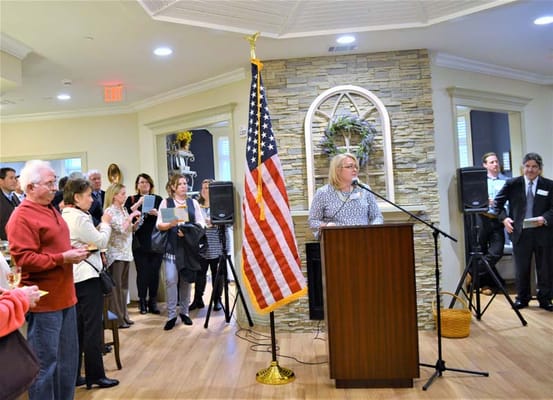 Residents and staff gathered for an event in the common area