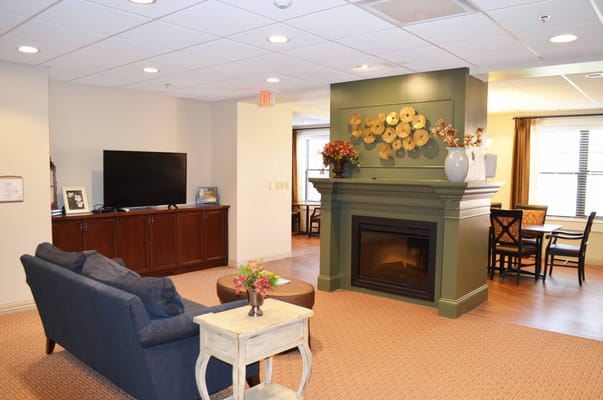 Interior common area with seating and fireplace