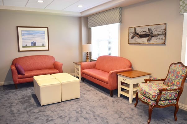 Bright common area with seating and decor