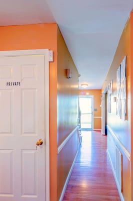 Hallway with a closed door labeled 'PRIVATE'