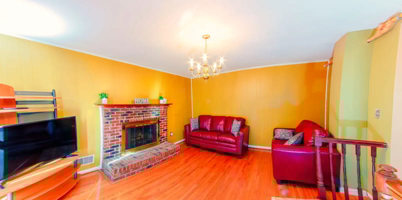 Cozy living room with a fireplace and seating